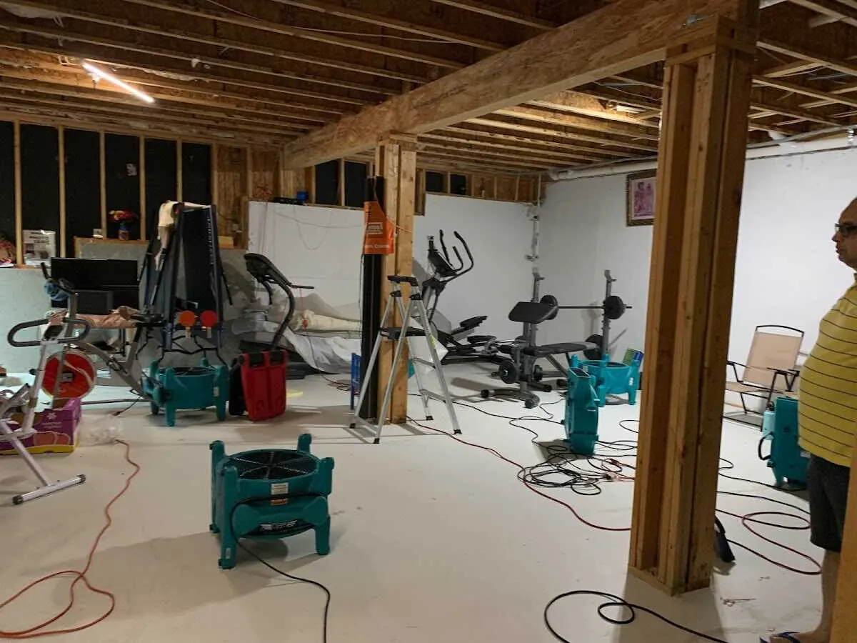 Basement drying equipment setup for Contents Cleaning & Restoration in Henniker