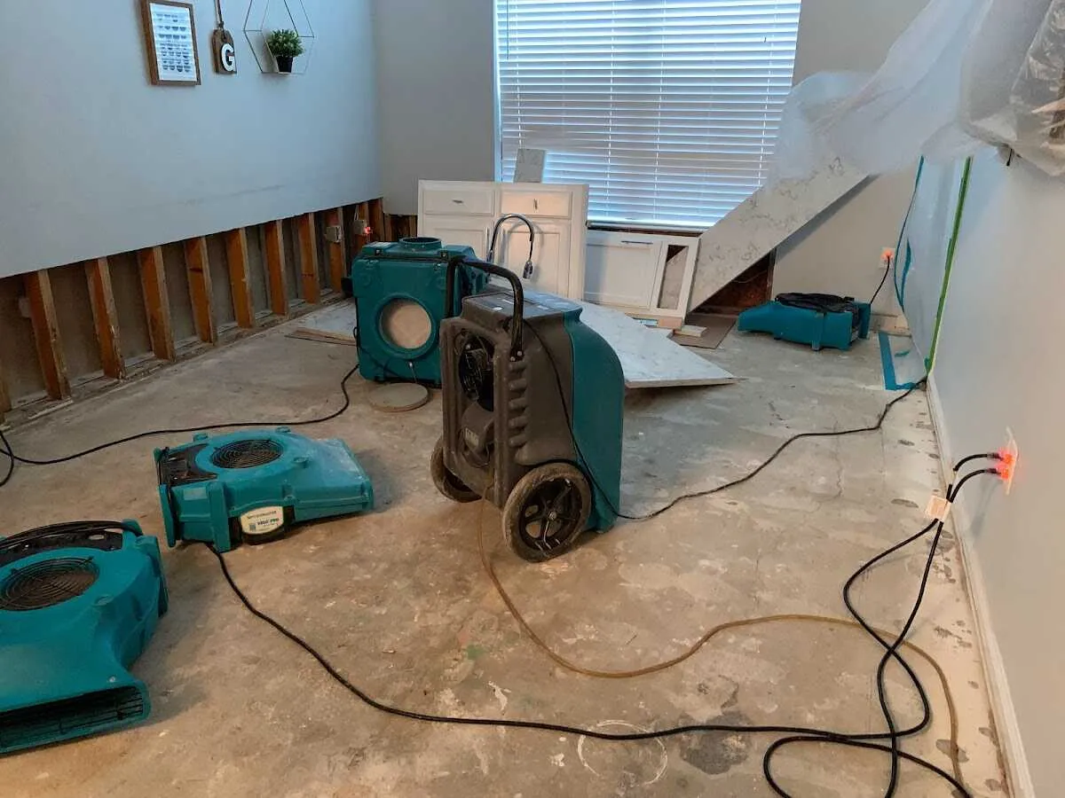 Dehumidifier in flood-cut room for Water Damage Restoration in Henniker
